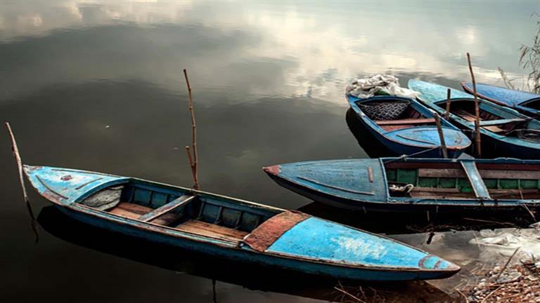 مجموعة من المراكب النيلية ترسو على الشاطيء- تصوير جلال المسري