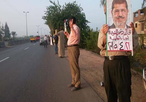 انصار الاخوان يحتجون على محاكمة مرسي                                                                                                                                                                    