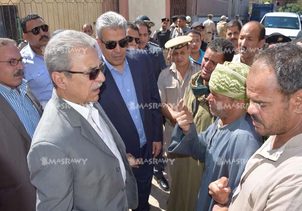 محافظ المنيا ومدير الأمن يتقدمان جنازة شهيد سيناء (1)                                                                                                                                                   