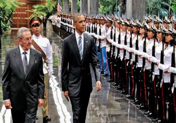 الرئيس الأمريكي باراك أوباما ونظيره الكوبي راؤول كاسترو                                                                                                                                                 