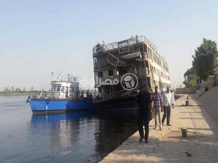 تعويم فندق عائم بعد غرقه جزئيًا في النيل جنوب الأقصر (1)                                                                                                                                                