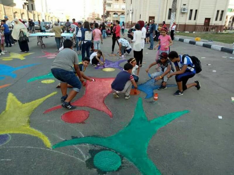 جرافيتي على الأسفلت في بورسعيد                                                                                                                                                                          