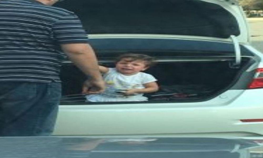 بالصور-أب يعاقب طفلته الرضيعة بوضعها داخل صندوق السيارة                                                                                                                                                 