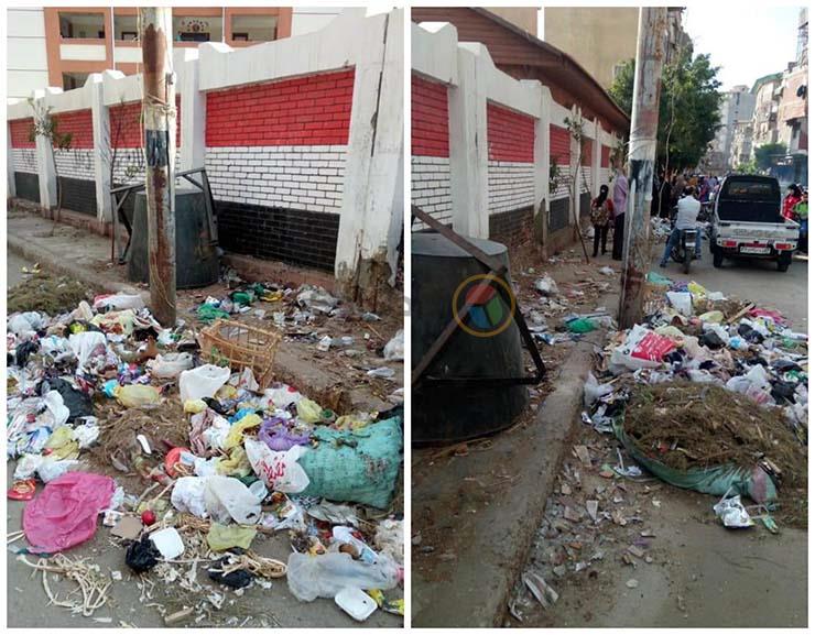 أكوام القمامة أمام مدرسة للغات بدمياط (2)
