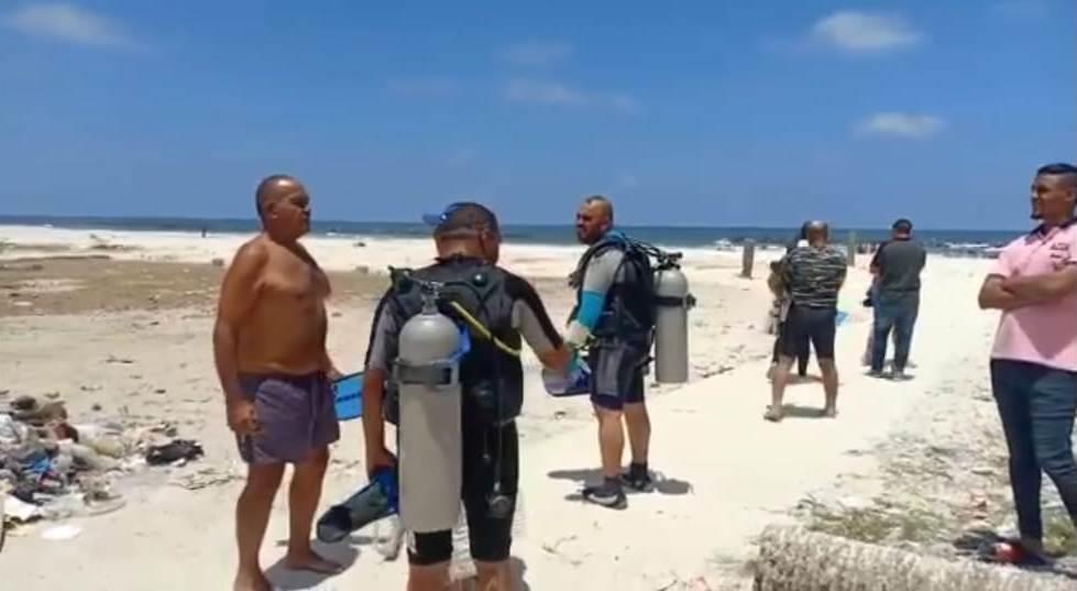فريق الاتحاد المصري للغوص يصل شاطئ النخيل