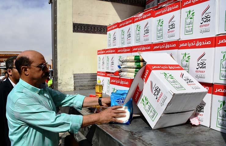 توزيع مساعدات تحيا مصر على متضرري سيول أسوان 