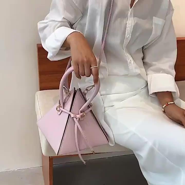 الحقيبة المثلثة نجمة موضة الصيف الحقيبة المثلثة نجمة موضة الصيف