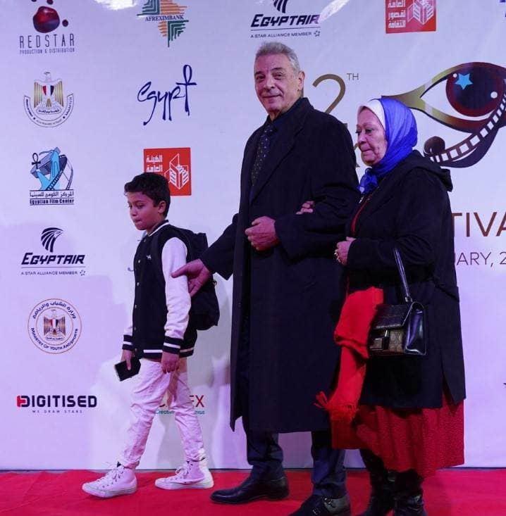 محمود حميدة رفقة زوجته في افتتاح مهرجان الأقصر للسينما الإفريقية