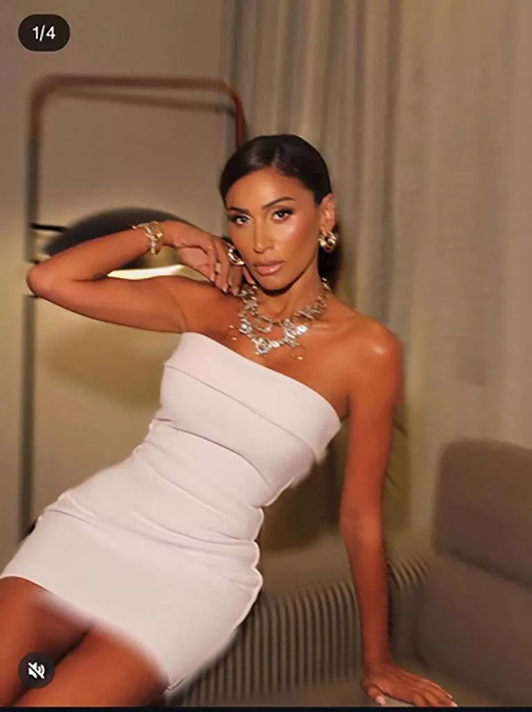 دينا الشربيني تخطف الأنظار بفستان أبيض أنيق.. تعرف على سعره | مصراوى