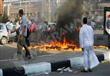 أنصار مرسي يشعلون النيران للتدفئة في مسيرة المعادي
