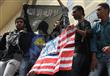 بالصور-  طلاب يرفعون علم ''القاعدة'' في تظاهرات ال