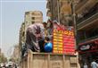 بالصور- محافظة الجيزة تشن حملة لإزالة إشغالات الطريق بشارع فيصل