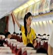 شركة طيران صينية تغير زي المضيفات الرسمى إلى قمصان