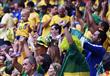 1403551403999_lc_galleryImage_A_Brazil_fan_holds_up_the