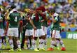 1404059870386_lc_galleryImage_Mexico_s_players_take_a_w
