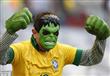 1403969012305_lc_galleryImage_A_fan_wearing_a_Hulk_mask                                                                                               