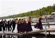 بالفيديو.. عروسان و معازيم يسقطون في مياه بحيرة
