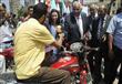 بالصور - محافظ القاهرة يوزع 50 دراجة بخارية لمتحدي الإعاقة مجاناً