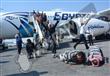 بالصور- وصول 268 عامل مصري إلى مطار القاهرة