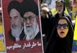 متظاهرة إيرانية في يوم القدس ترفع صورة للمرشد الأع