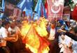 أعلام صينية أحرقت في مظاهرات مناهضة للصين في تركيا