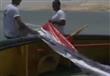 علم مصر يطفو فوق القناة الجديدة بطول 5 كيلو متر 
