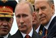 الرئيس الروسي والى يمينه وزير الدفاع سيرغيه شويغو 