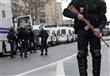 ملثمون يرشقون قوات الأمن خلال مظاهرة في باريس ضد ق