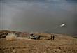 جنود عراقيون خلال اطلاق راجمة صواريخ باتجاه مواقع 