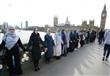 مجموعة من السيدات المسلمات يظهرن دعمهن لضحايا الهج