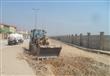 بالصور- محافظة الجيزة ترفع 1500 طن مخلفات من أرض م