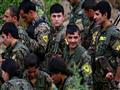 عناصر من وحدات حماية الشعب الكردية خلال تدريبات في