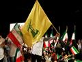 ايرانيون يرفعون علم حزب الله اللبناني خلال الانتخا