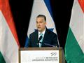 رئيس الوزراء المجري فيكتور اوربان اثناء القائه خطا