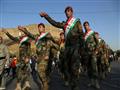 مقاتلو البيشمركة خلال مسيرة مؤيدة لاستقلال كردستان