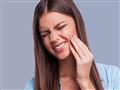 لماذا تشعرين بألم الأسنان أثناء الدورة الشهرية؟