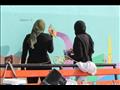 طالبات ينفذن الرسم على الحوائط في مبادرة تجميل مدينة دسوق                                                                                                                                               