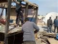إزالة العشش من أسطح عمارات حي الزهور في بورسعيد (4)                                                                                                                                                     