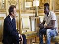 الرئيس الفرنسي ومهاجر مالي