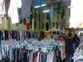 احد محال بيع الملابس المستعملة في بورسعيد                                                                                                                                                               