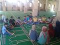 أطفال يتلقون دروس دينية بأحد مساجد الإسكندرية                                                                                                                                                           