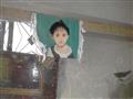 لوحة من الجوبلان مصنعة برسم وجه طفلة                                                                                                                                                                    