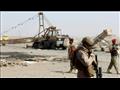 جنود من التحالف العسكري في اليمن يحرسون مطاحن البح