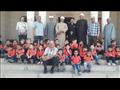 أطفال حضانة مريم العذراء مع ائمة مسجد بدر