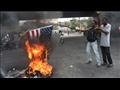 متظاهرون في هايتي يحرقون علم الولايات المتحدة في ا