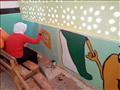 طالبات الفنية بالداخلة ينفذن مبادرة تجميل أسوار المدارس بزخارف ولوحات جدارية  (11)