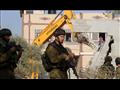 جرافات الاحتلال الإسرائيلي تهدم أحد المنازل - أرشي