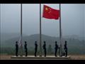 رفع العلم الصيني خلال مراسم افتتاح العاب الجيش الد