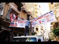 إزالة لافتات دعاية انتخابية في الإسكندرية 