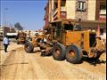 اعمال تعلية وتسوية للشوارع بحي فيصل قبل اعمال الرصف 
